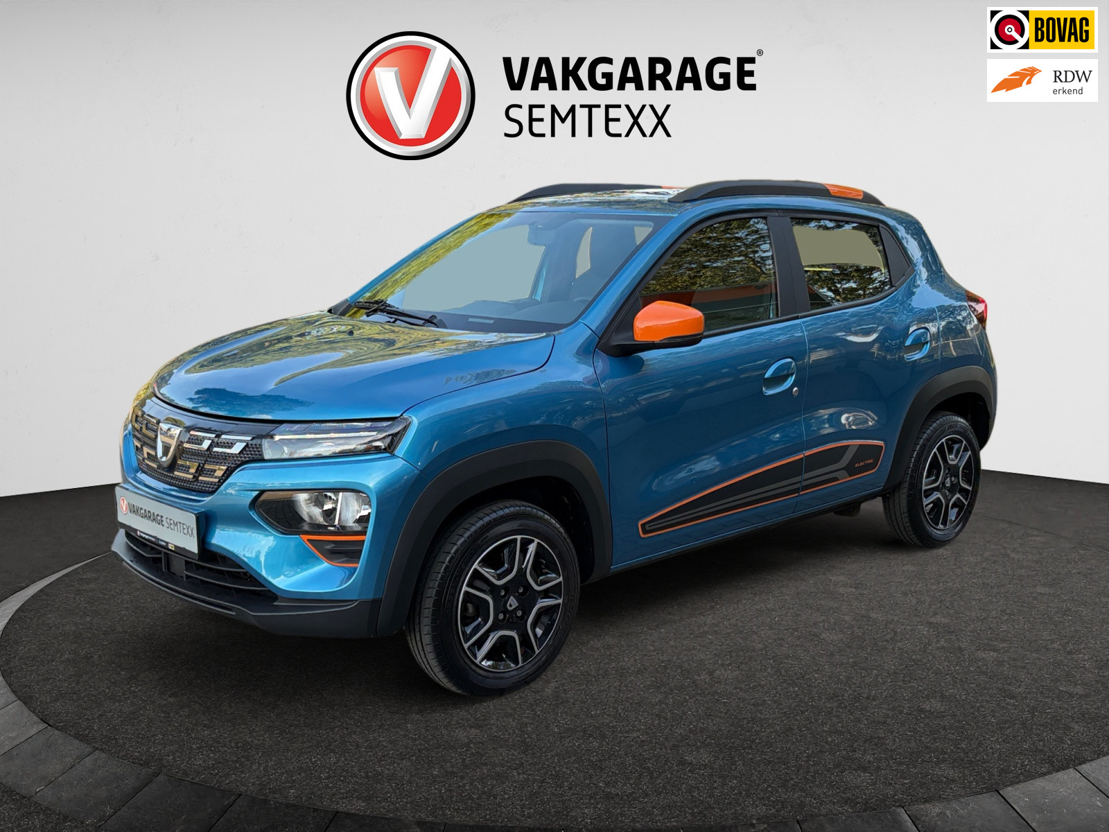Dacia Spring Comfort Plus (Orange Pack) 27 kWh | Automaat | Airco | Cruise | Navi | Leder | Camera | Apple Carplay | Android Auto