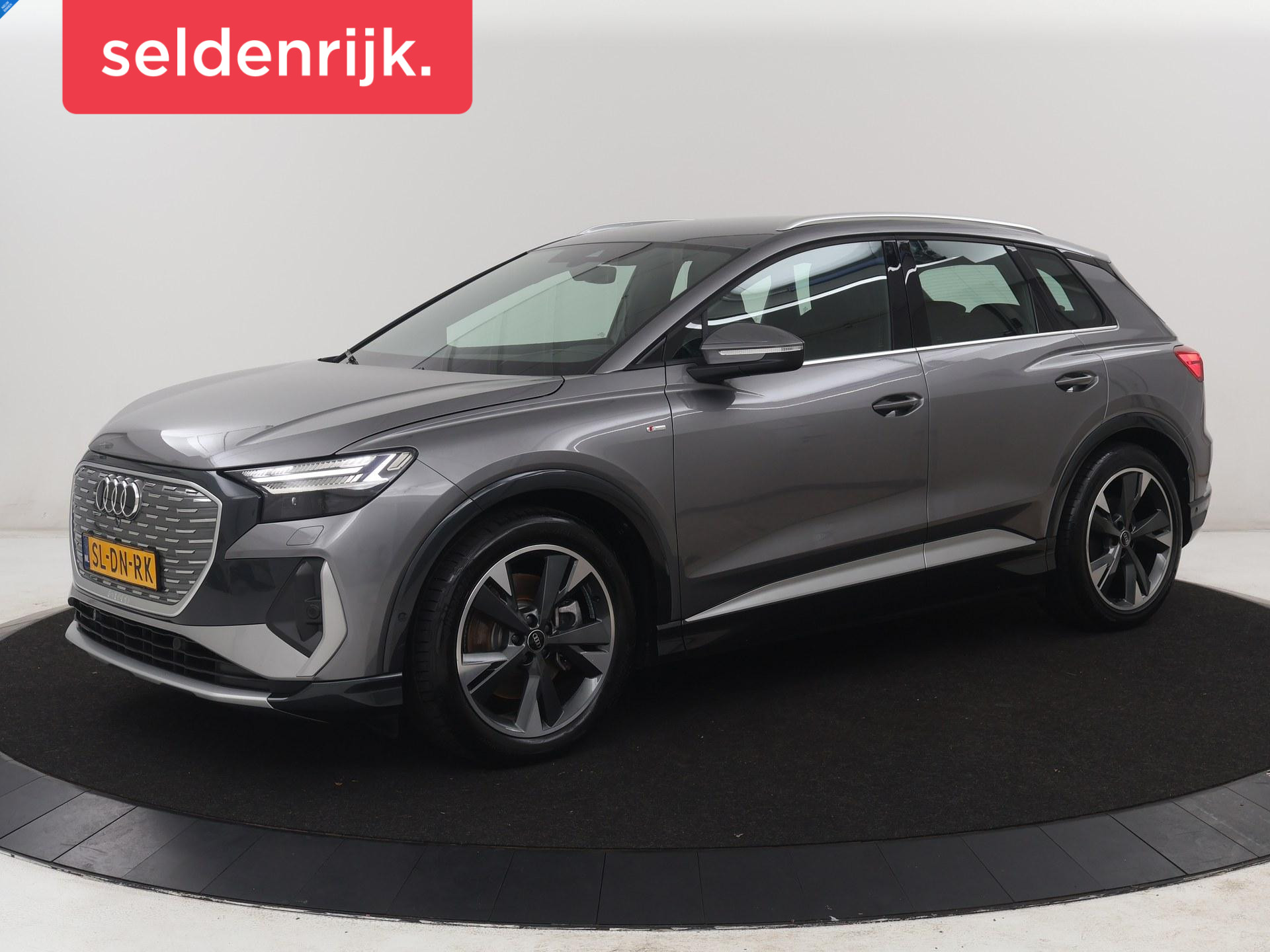 Audi Q4 e-tron 40 77KWH 150 KW S-Line | SOH 96,3% | Half leder | Adaptive cruise |