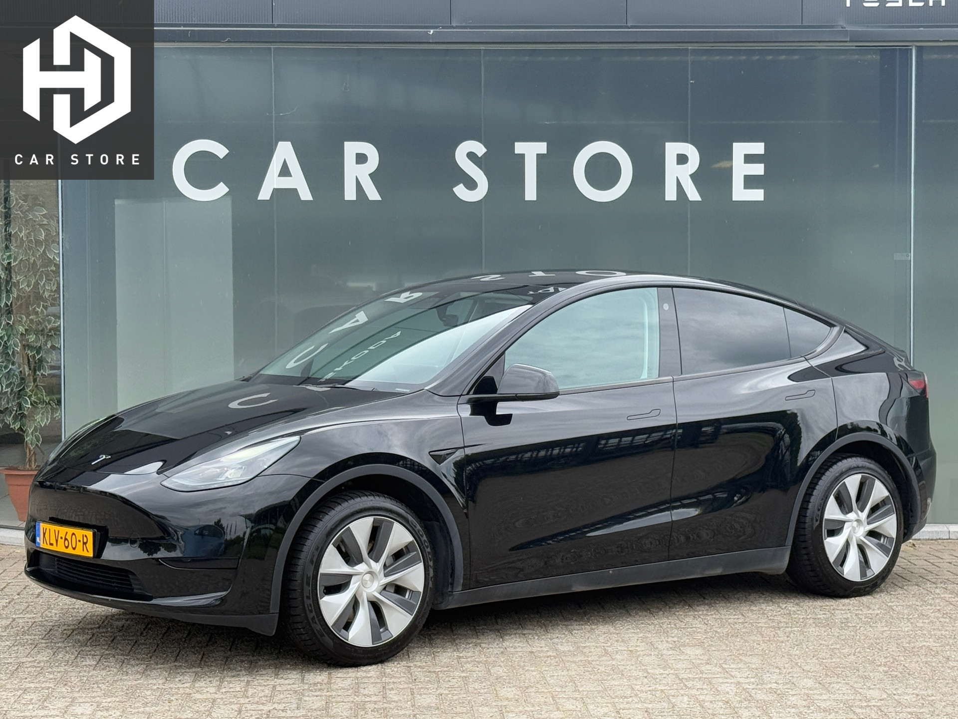 Tesla Model Y RWD 58 kWh 98% SOH LFP Autopilot Dealer Onderhouden
